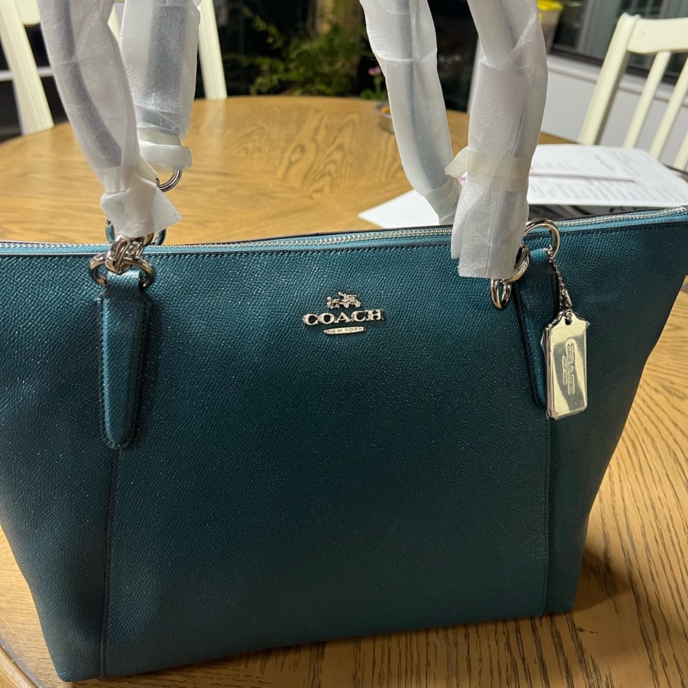 Brand New Coach Bag. Blue with a hint of glitter.